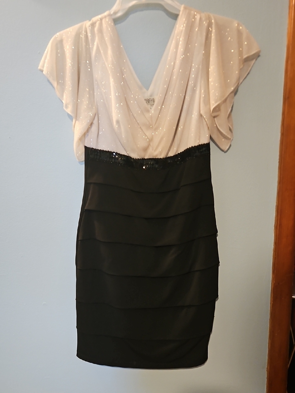 Elegant Two-Tone Black and Ivory Flutter Sleeve Skirted Dress